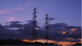 Power pylon in evening sky